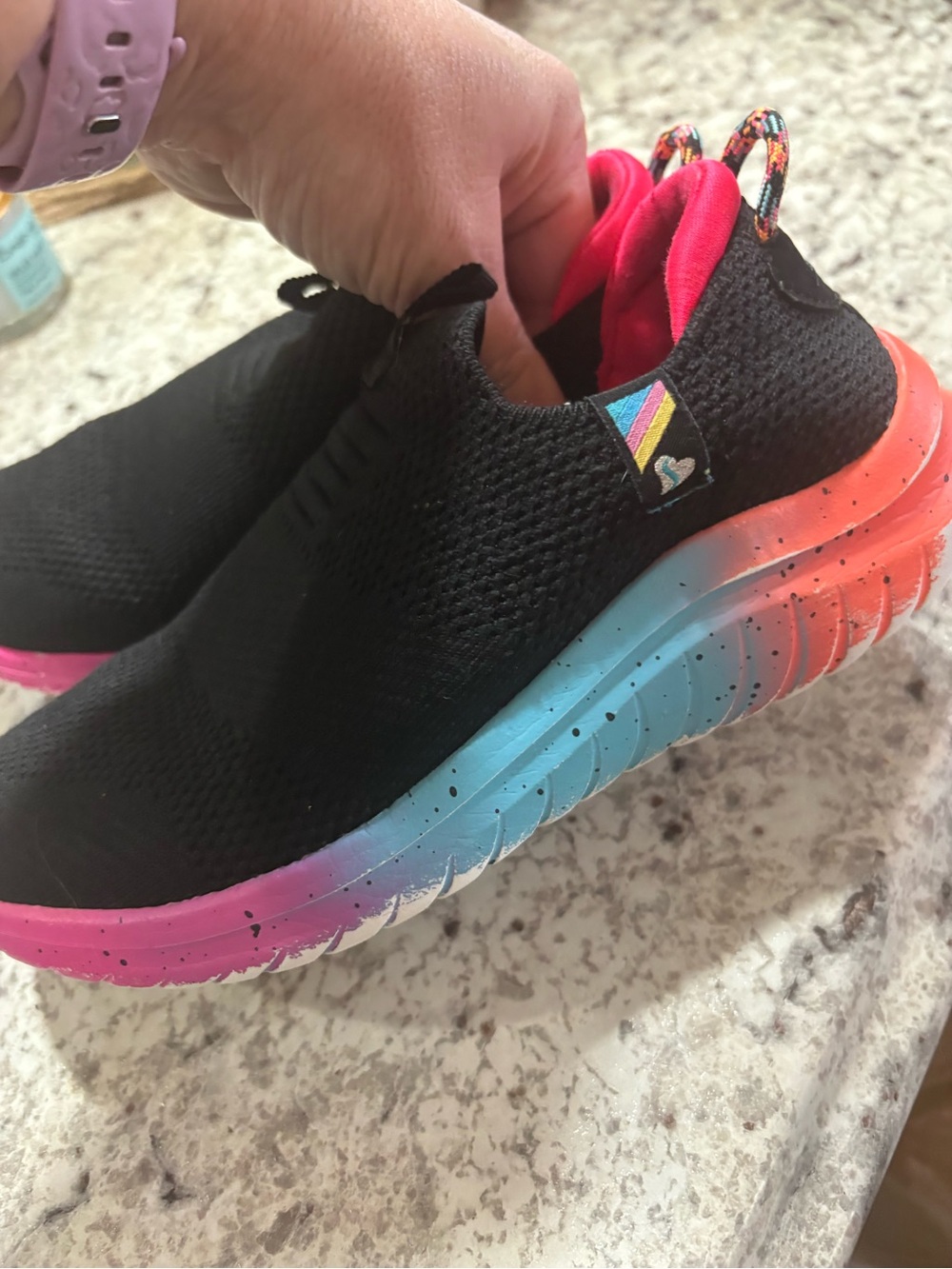 Skechers Kids Black Slip-On Sneakers with Pink Inner and Rainbow Gradient Sole